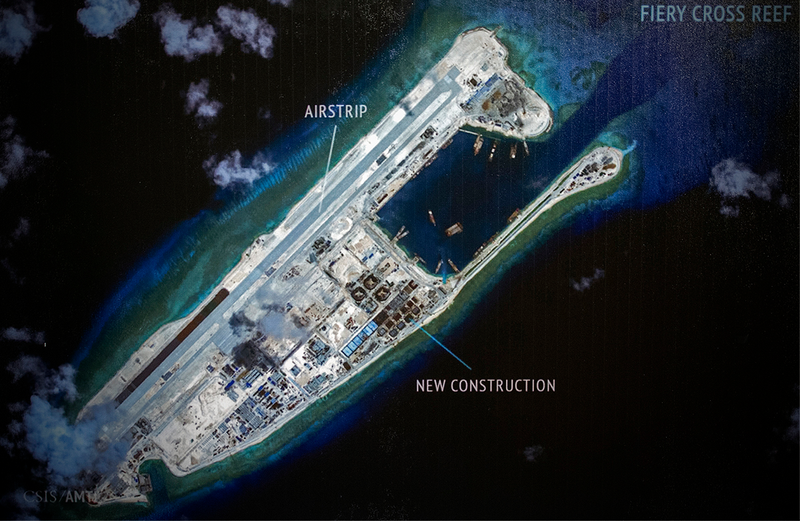 Illustration for article titled These Are The First Photos Of Aircraft Flying From China's Man-Made Island Outpost